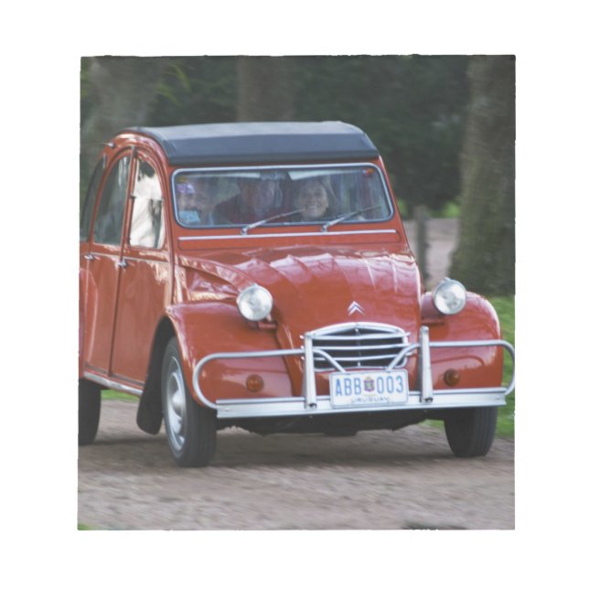 An old red Citroen 2CV car with a smiling woman Notepad (Front)