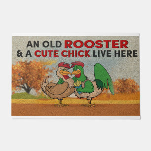 An Old Rooster And A Cute Chick Live Here Doormat