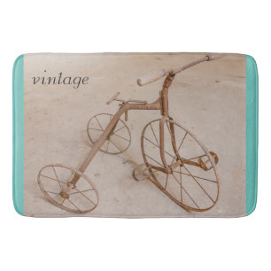 AN OLD TRICYCLE 1928 BATH MATS