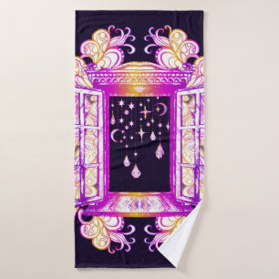 An open vintage window with pendants against a bac bath towel