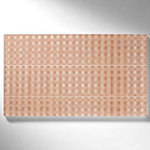 an orange and white geometric pattern name tag