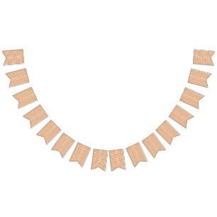 an orange and white pattern on a white background bunting