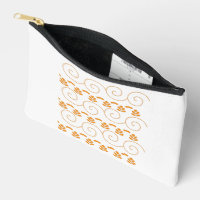 an orange and white pattern with swirls on it