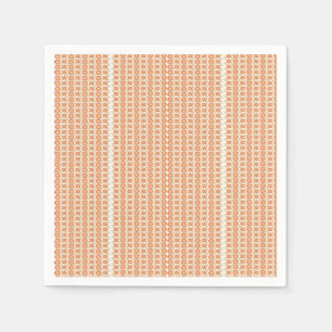 an orange and white striped background with small napkin