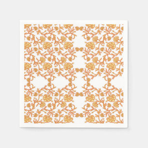 an orange and white wallpaper with a floral design napkin