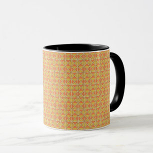 an orange and yellow background with a pattern mug