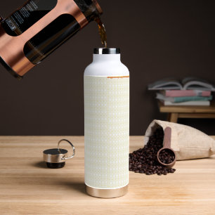 an orange and yellow background with small dots water bottle