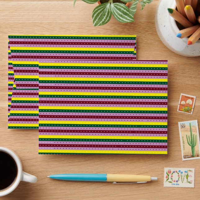 an orange and yellow background with small squares envelope (Desk)