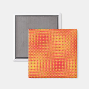 an orange and yellow background with small squares magnet