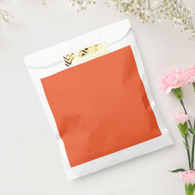 an orange background with a favour bags (Sealed)