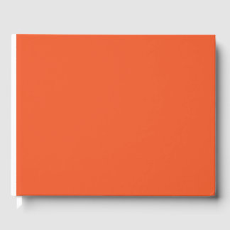 an orange background with a guest book
