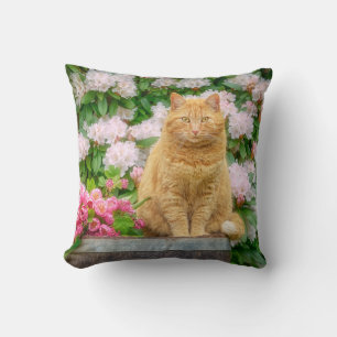 An Orange Cat in a Garden with Pink Spring Flowers Cushion