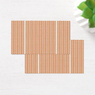 An orange rug with a textured pattern lies flat on