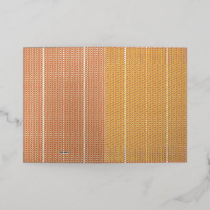 An orange rug with a textured pattern lies flat on foil greeting card