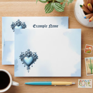 An ornate light blue archway with floral accents, envelope