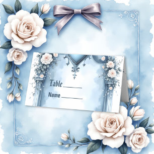 An ornate light blue archway with floral accents, place card
