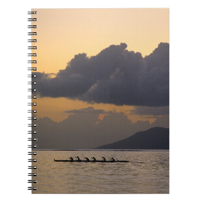An outrigger canoe team practices off the coast notebook (Front)