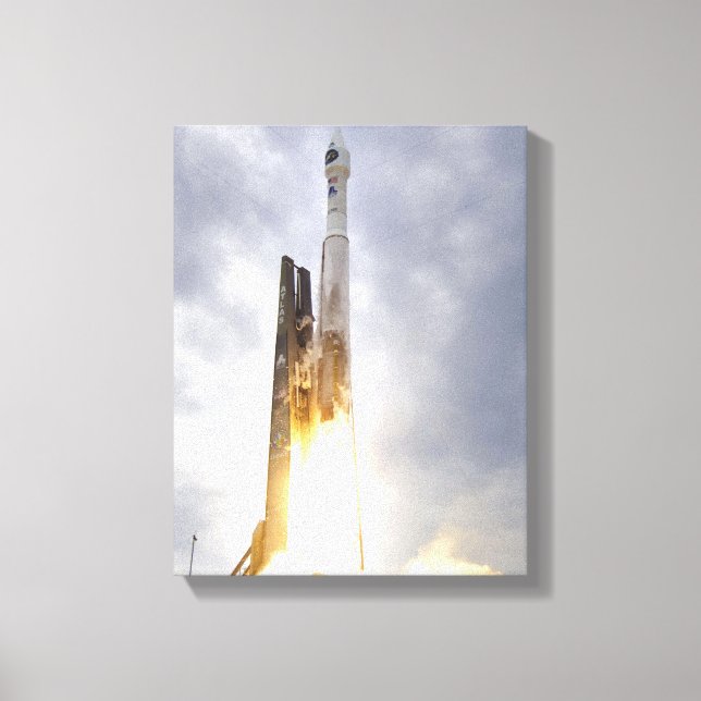An United Launch Alliance Atlas V rocket lifts Canvas Print (Front)