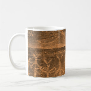 ancient design on the cave wall. history of antiqu coffee mug