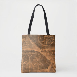 ancient design on the cave wall. history of antiqu tote bag