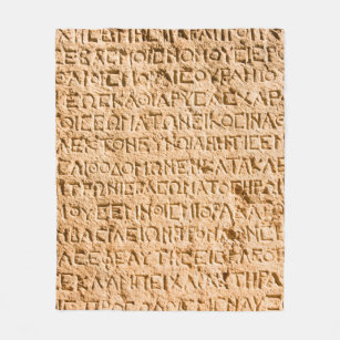 ancient Greek writing chiseled on stone Fleece Blanket