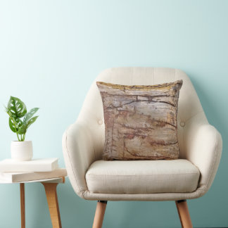 Ancient rock art in earthy tones cushion