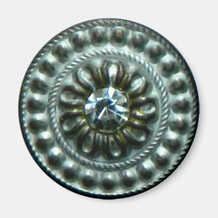 Ancient silver brooch with gem magnet