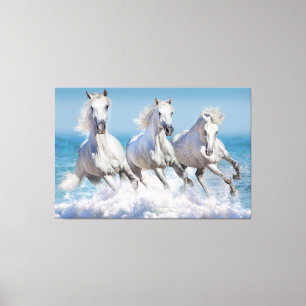 Andalusian white horses run in the waves canvas print