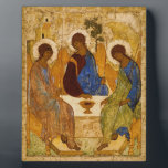 Andrei Rublev Holy Trinity Icon Orthodox religion Plaque<br><div class="desc">The Holy Trinity Icon (aka 'The Hospitality of Abraham') is a panel painting created by Andrei Rublev (c.1360-1430) in the early 15th century. Probably the most famous of all Russian religious paintings,  it represents one of the highpoints of Russian art of the late Mediaeval era.</div>