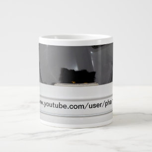 Andy the Persian cat likes to sleep in the dryer.. Large Coffee Mug