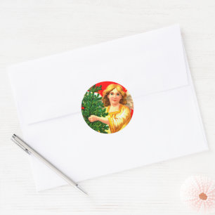 Angel in Yellow Carrying Xmas Tree Classic Round Sticker