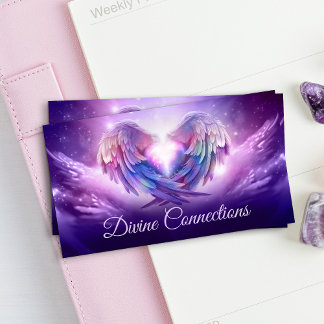 Angel wings gently embracing the heart business card