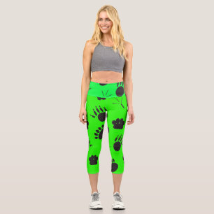Animal and Bird Footprint, green background Capri Leggings