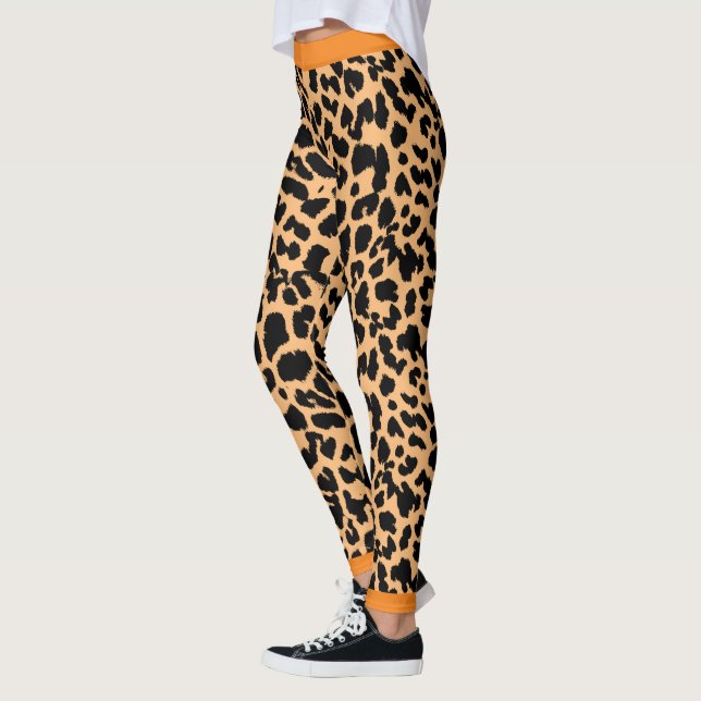 Animal Lovers Leopard Print Black on Light Orange Leggings (Left)