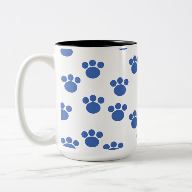 Animal Paw Print Pattern. Blue and White. Two-Tone Coffee Mug (Left)