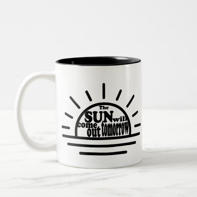 Annie: Sun Will Come Out Tomorrow Two-Tone Coffee Mug (Left)