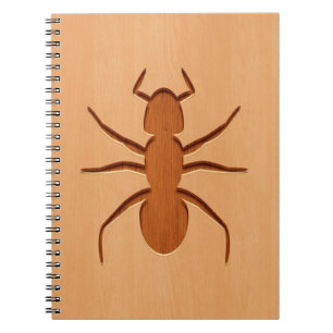 Ant silhouette engraved on wood design notebook