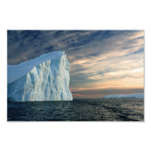 Antarctic Iceberg, Icy Waters, Dramatic Sky Photo