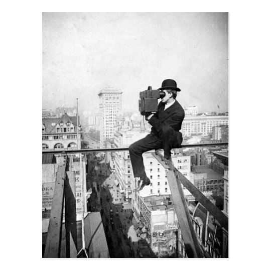 antique camera on a city highrise vintage photo postcard