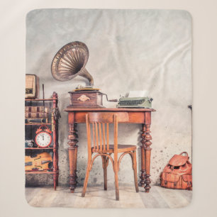 Antique chair, old typewriter, retro radio, gramop sherpa blanket