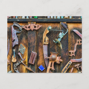 Antique collection on wall postcard