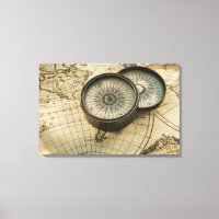 Antique compass on map