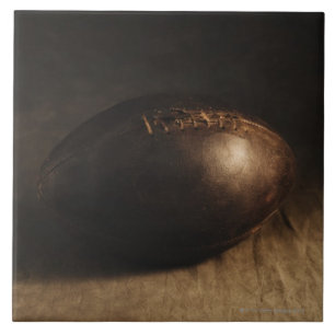 Antique football tile