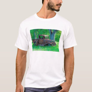 Antique rusted truck in a meadow T-Shirt