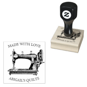 Antique sewing machine with name rubber stamp