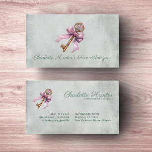 Antique shop interior design old key pink bow business card