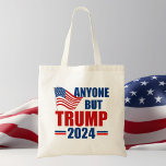 Anyone But Trump 2024 Funny Political Tote Bag<br><div class="desc">Vote for anyone but Trump in the 2024 election to stay patriotic. Republicans and Democrats need to unite against Donald Trump and vote for Joe Biden so we can keep America safe. American flag on a political tote bag with anti Trump message.</div>