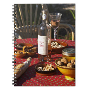 Aperitif and appetizers prepared: bread, olives, notebook
