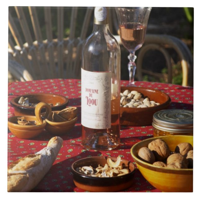 Aperitif and appetizers prepared: bread, olives, tile (Front)