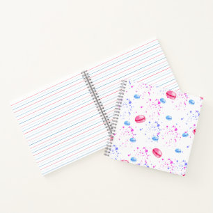 Appetising macarons in watercolor splatters notebook